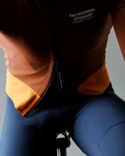 Pas Normal Studios Men's Mechanism Thermal Jacket — Mahogany / Dark Orange^ Jackets & Gilets